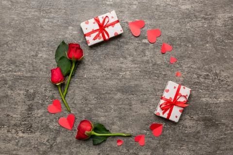 Heart made of rose, git box, heart and blank greeting card mockup on Colored  写真素材