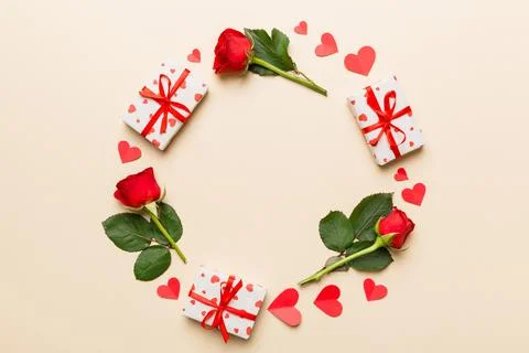 Heart made of rose, git box, heart and blank greeting card mockup on Colored  写真素材