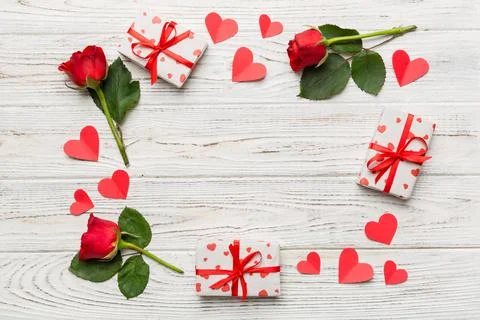 Heart made of rose, git box, heart and blank greeting card mockup on Colored  写真素材