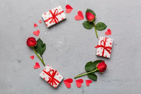 Heart made of rose, git box, heart and blank greeting card mockup on Colored  写真素材