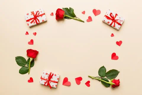 Heart made of rose, git box, heart and blank greeting card mockup on Colored  写真素材