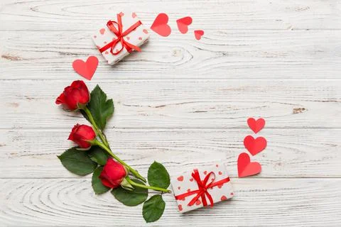 Heart made of rose, git box, heart and blank greeting card mockup on Colored  写真素材