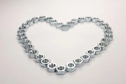 Heart of nuts on white Stock Photos