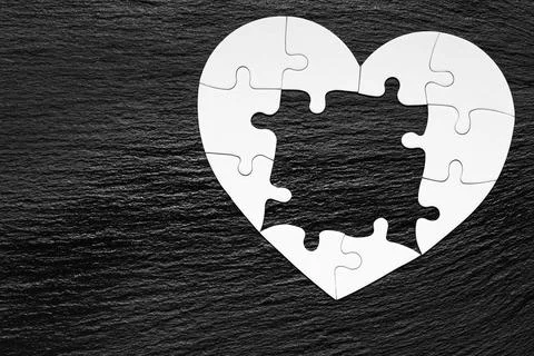 Heart object made of puzzle pieces. Make complete heart. Jigsaw puzzle pieces Stock Photos