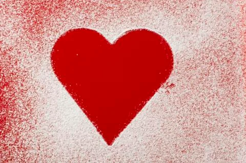 Heart pattern on the bottom of a red bowl Stock Photos