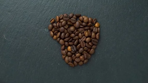 Heart pattern, made of roasted coffee beans. Stock Footage 155301029