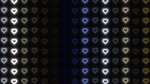 Heart patterns in glowing lights create a vibrant display Stock Footage 338228980