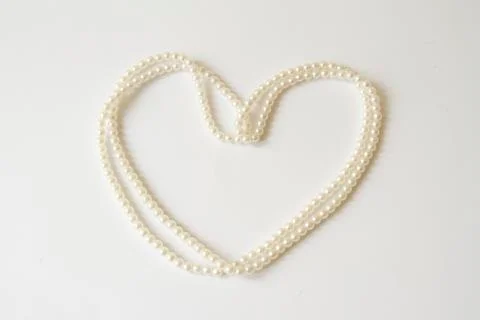 Heart from pearls isolated Stock Illustration