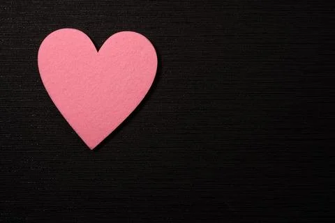 Heart  on pink background Stock Photos