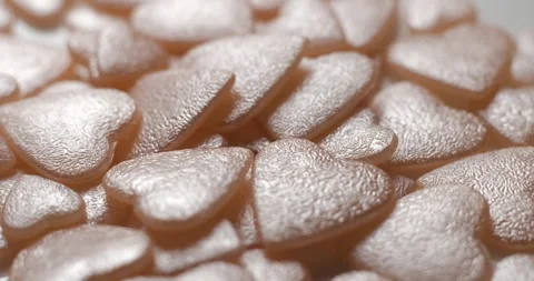 Heart pink decorative elements rotating close up, studio 4K Video stock 263686879