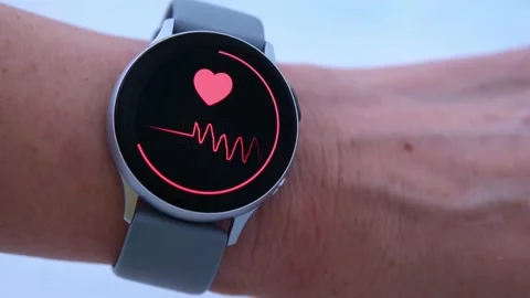Heart rate check with smart watch. Close-up Stock Footage 170880002