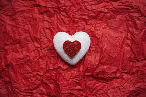 Heart on a red background. Stock Photos