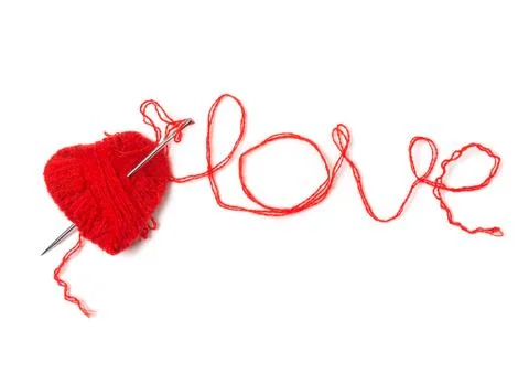 Heart of red threads pierced by a needle. Isolated on a white background Stock Photos