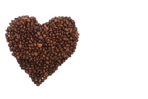 Heart of roasted coffee beans isolated on a white background. space for your  Stock Photos