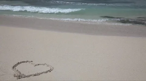 Heart on the sand Stock Footage 4280917