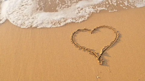 Heart on the sand Stock Footage 83538885