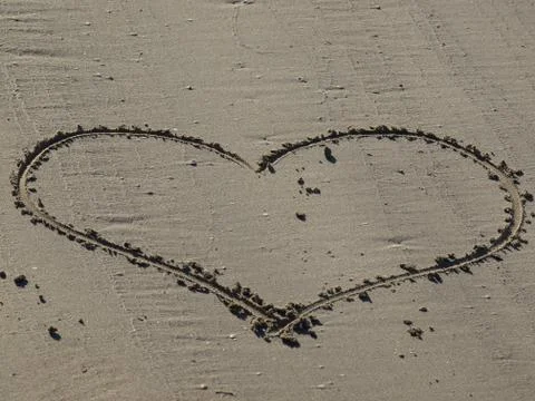 Heart in the sand Stock Photos