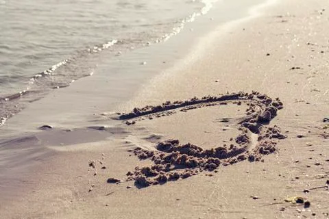 Heart in the sand Stock Photos
