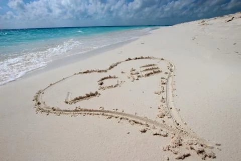 Heart in the sand Stock-Fotos