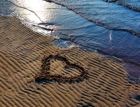 Heart on the sand Stock Photos