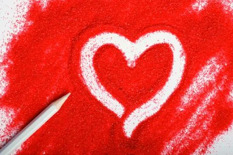 Heart on sand Stock Photos