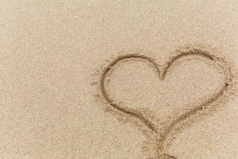 Heart on the sand Stockfoto's