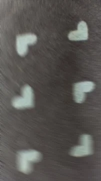 Heart seamless pattern retro, with blurred bokeh vertical black background. Stock Photos