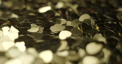 Heart sequins golden rotating close up, studio 4K Stock Footage 263686973