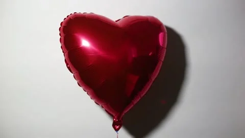 Heart shape air balloon on light background. Valentine s Day. Stock Footage 150264323