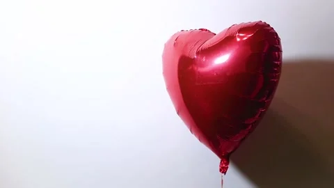 Heart shape air balloon on light background. Valentine s Day. Stock Footage 150264350