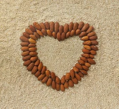 Heart shape from almonds Stock Photos
