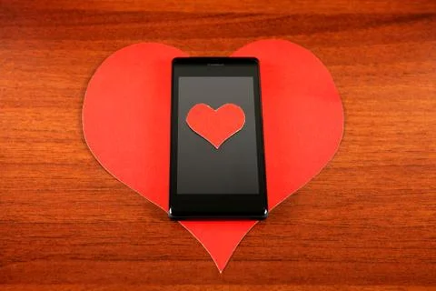 Heart Shape and Cellphone Stock Photos