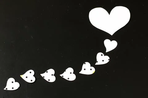 Heart shape on black background Stock Photos