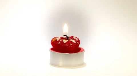 Heart shape candle burning Stock Footage 48351518