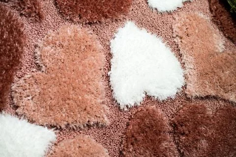 Heart shape carpet at close up Stock Photos