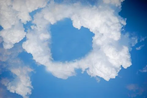 Heart shape cloud on blue sky, Valentine's day concept. Stock Photos