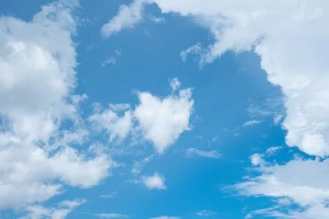 Heart shape cloud on clear blue sky Stock Photos