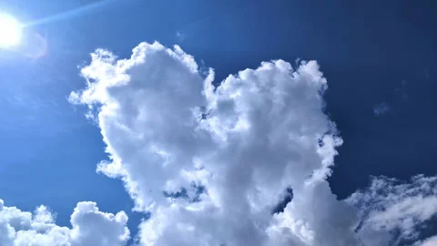 Heart shape clouds and sunshine in blue sky, view from bellow 스톡 동영상 280255841