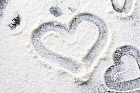 Heart shape drawn on the table Stock Photos