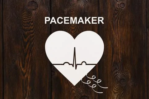 Heart shape with echocardiogram and PACEMAKER text. Cardiology concept Stock Photos
