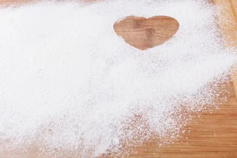 Heart shape in flour Stock Photos