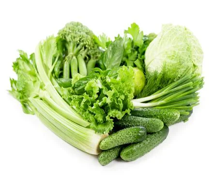 Heart shape form by vegetables isolated on the white background. Stock Photos