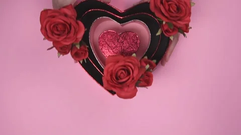 Heart shape gift box on pink background. Stock Footage 147946470