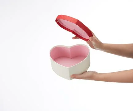 Heart shape gift box on the white background with copy space Stock Photos