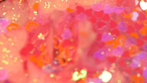 Heart shape glitter texture, leaks, bokeh, valentine's day abstract background Stock Footage 143304386