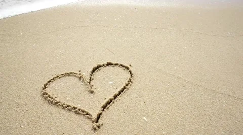 Heart shape got wash out by sea wave Stock Footage 46098162