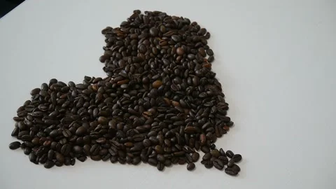 Heart shape made from coffee beans. 스톡 동영상 105672225