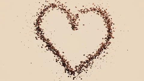 Heart shape made of coffee beans isolate on beige color. Video stock 284812603