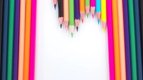Heart shape made from multicolored pencils 库存影片 181063663