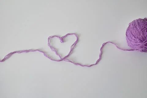 Heart Shape Made from Purple Thread Stock Photos